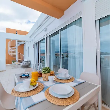 Apartment Atico Cholas By The