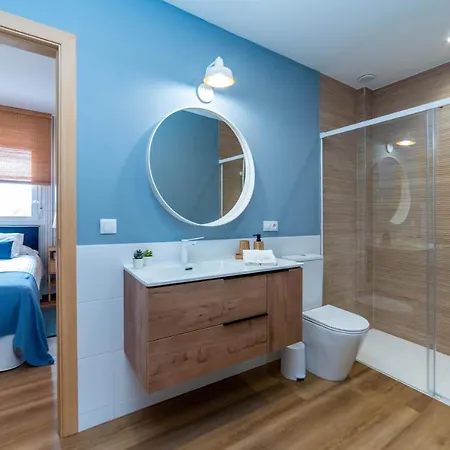 Apartment Atico Cholas By The