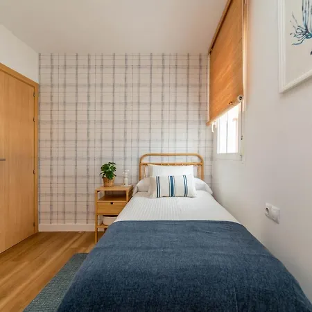 Apartment Atico Cholas By The