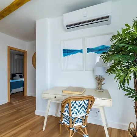 Apartment Atico Cholas By The