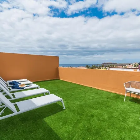Apartment Atico Cholas By The
